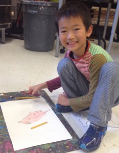 Komei is drawing a cardinal for the winter scene.